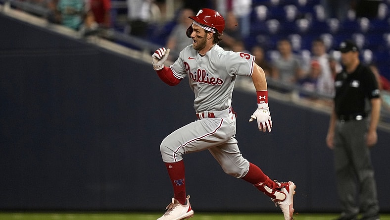 Oct 1, 2021; Miami, Florida, USA; Philadelphia Phillies right fielder Bryce Harper (3) runs to second base for a RBI double against the Miami Marlins in the 3rd inning at loanDepot park. Mandatory Credit: Jasen Vinlove-USA TODAY Sports