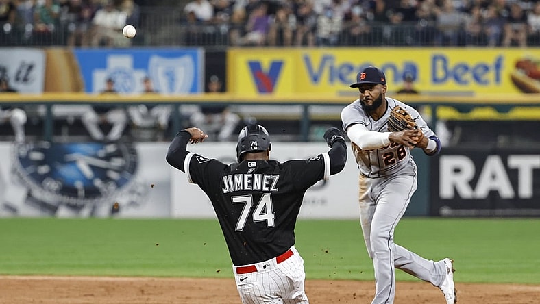 Oct 1, 2021; Chicago, Illinois, USA; Detroit Tigers third baseman Niko Goodrum (28) throws out Chicago White Sox left fielder Eloy Jimenez (74) at second base during the third inning at Guaranteed Rate Field. Mandatory Credit: Kamil Krzaczynski-USA TODAY Sports