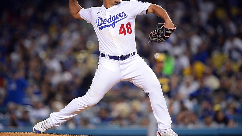 Oct 1, 2021; Los Angeles, California, USA; Los Angeles Dodgers relief pitcher Brusdar Graterol (48) throws against the Milwaukee Brewers during the third inning at Dodger Stadium. Mandatory Credit: Gary A. Vasquez-USA TODAY Sports
