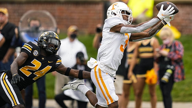 Oct 2, 2021; Columbia, Missouri, USA; Tennessee Volunteers wide receiver JaVonta Payton (3) catches a touchdown pass against Missouri Tigers defensive back Allie Green IV (24) during the first half at Faurot Field at Memorial Stadium. Mandatory Credit: Jay Biggerstaff-USA TODAY Sports