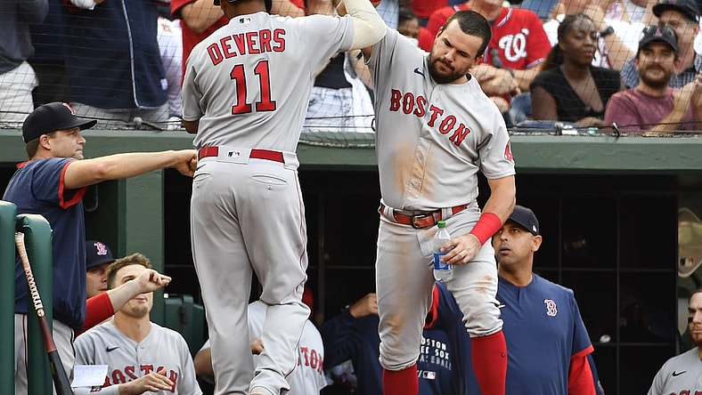 Oct 2, 2021; Washington, District of Columbia, USA; Boston Red Sox third baseman Rafael Devers (11) is congratulated by first baseman Kyle Schwarber (18) after hitting a home run against the Washington Nationals during the fourth inning at Nationals Park. Mandatory Credit: Brad Mills-USA TODAY Sports