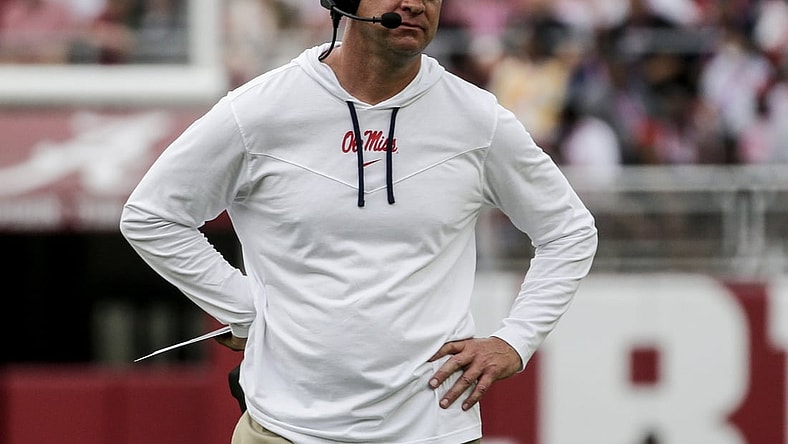 Oct 2, 2021; Tuscaloosa, Alabama, USA;  Mississippi Rebels head coach Lane Kiffin reacts after turning the ball over against the Alabama Crimson Tide during the second half of an NCAA college football game at Bryant-Denny Stadium. Mandatory Credit: Butch Dill-USA TODAY Sports