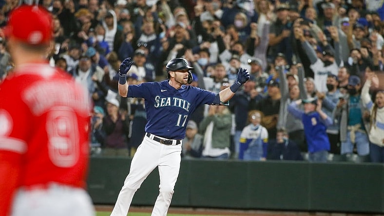 Oct 2, 2021; Seattle, Washington, USA; Seattle Mariners right fielder Mitch Haniger (17) reacts after hitting a two-RBI single against the Los Angeles Angels during the eighth inning at T-Mobile Park. Mandatory Credit: Joe Nicholson-USA TODAY Sports