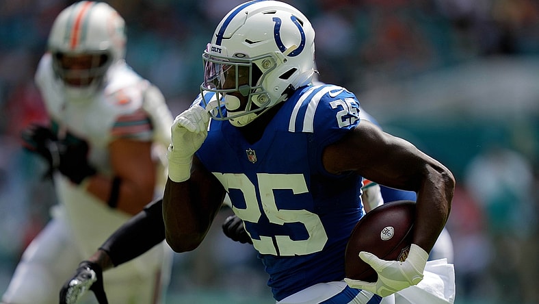 Oct 3, 2021; Miami Gardens, Florida, USA; Indianapolis Colts running back Marlon Mack (25) runs the ball against the Miami Dolphins during the first half at Hard Rock Stadium. Mandatory Credit: Jasen Vinlove-USA TODAY Sports