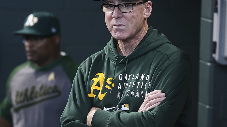 Oct 3, 2021; Houston, Texas, USA; Oakland Athletics manager Bob Melvin (6) looks on from the dugout before the start of the game against the Houston Astros at Minute Maid Park. Mandatory Credit: Troy Taormina-USA TODAY Sports