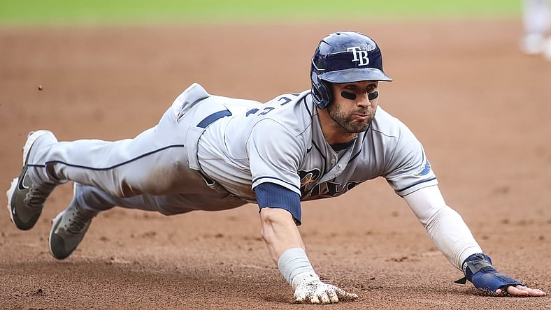 Oct 3, 2021; Bronx, New York, USA; Tampa Bay Rays center fielder Kevin Kiermaier (39) slides into third base in the third inning against the New York Yankees at Yankee Stadium. Mandatory Credit: Wendell Cruz-USA TODAY Sports