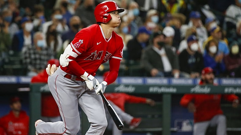 Oct 3, 2021; Seattle, Washington, USA; Los Angeles Angels designated hitter Shohei Ohtani (17) hits a solo-home run against the Seattle Mariners during the first inning at T-Mobile Park. Mandatory Credit: Joe Nicholson-USA TODAY Sports