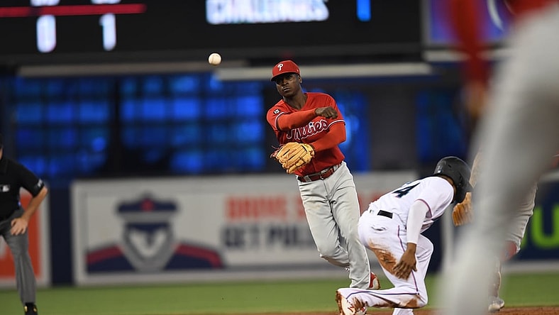 Oct 3, 2021; Miami, Florida, USA; Philadelphia Phillies shortstop Didi Gregorius (18) turns a double play against the Florida Marlins in the 2nd inning at loanDepot Park. Mandatory Credit: Jeremy Reper-USA TODAY Sports