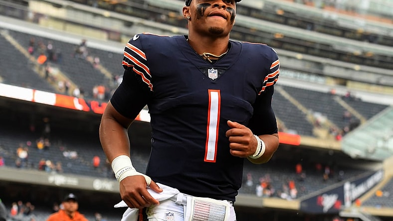Oct 3, 2021; Chicago, Illinois, USA; Chicago Bears quarterback Justin Fields (1) leaves the field after the game against the Detroit Lions at Soldier Field. Mandatory Credit: Quinn Harris-USA TODAY Sports
