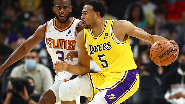 Oct 6, 2021; Phoenix, Arizona, USA; Los Angeles Lakers guard Talen Horton-Tucker (5) against Phoenix Suns guard Chris Paul (3) during a preseason game at Footprint Center. Mandatory Credit: Mark J. Rebilas-USA TODAY Sports