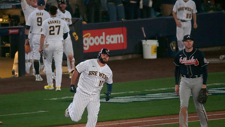 Milwaukee Brewers first baseman Rowdy Tellez (11) rounds first after hitting a two-run homer during the seventh inning of their National League Division Series game against the Atlanta Braves Friday, October 8, 2021 at American Family Field in Milwaukee, Wis.MARK HOFFMAN/MILWAUKEE JOURNAL SENTINEL

Mjs Brewers09 12 Jpg Brewers09