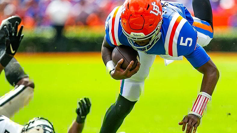 Florida Gators quarterback Emory Jones (5) flies forward for extra yards in the first half. The Florida Gators lead 21-0 at the half over the Vanderbilt Commodores Saturday afternoon, October 9, 2021 at Ben Hill Griffin Stadium in Gainesville, FL. [Doug Engle/Gainesville Sun]2021

Flgai 100921 Gatorgamevandy