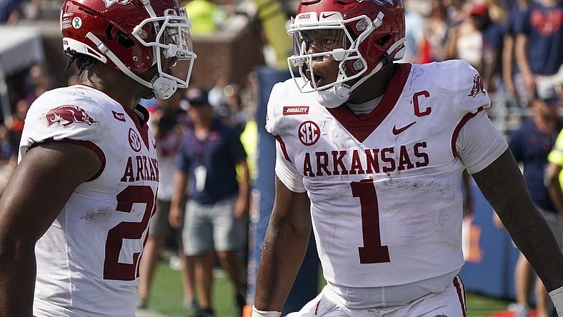 Oct 9, 2021; Oxford, Mississippi, USA; Arkansas Razorbacks quarterback KJ Jefferson (1) celebrates with Arkansas Razorbacks running back Dominique Johnson (20) after Jefferson scored a touchdown against Mississippi Rebels at Vaught-Hemingway Stadium. Mandatory Credit: Marvin Gentry-USA TODAY Sports