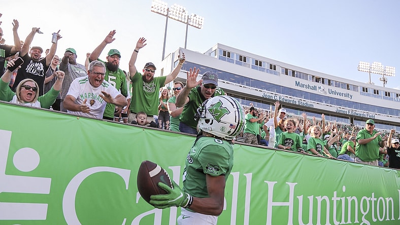 Oct 9, 2021; Huntington, West Virginia, USA; Marshall Thundering Herd wide receiver Shadeed Ahmed (0) celebrates with fans after catching a touchdown pass during the first overtime against the Old Dominion Monarchs at Joan C. Edwards Stadium. Mandatory Credit: Ben Queen-USA TODAY Sports
