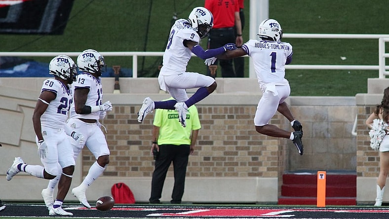 Oct 9, 2021; Lubbock, Texas, USA;  Texas Christian Horned Frogs defensive corner back Tre Vius Hodges-Thomlison (1) and defensive corner back C.J. Ceaser (9) react after scoring a touchdown against the Texas Tech Red Raiders in the first half at Jones AT&T Stadium. Mandatory Credit: Michael C. Johnson-USA TODAY Sports