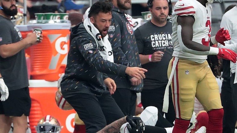 Oct 10, 2021; Glendale, Arizona, USA; Arizona Cardinals tight end Maxx Williams (87) grabs his knee after a catch and run against the San Francisco 49ers during the second quarter at State Farm Stadium. He was taken off the field on a cart. Mandatory Credit: Michael Chow-USA TODAY Sports