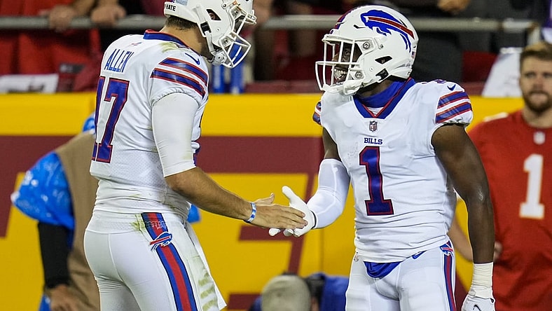 Oct 10, 2021; Kansas City, Missouri, USA; Buffalo Bills wide receiver Emmanuel Sanders (1) celebrates with quarterback Josh Allen (17) after scoring a touchdown against the Kansas City Chiefs during the first half at GEHA Field at Arrowhead Stadium. Mandatory Credit: Jay Biggerstaff-USA TODAY Sports