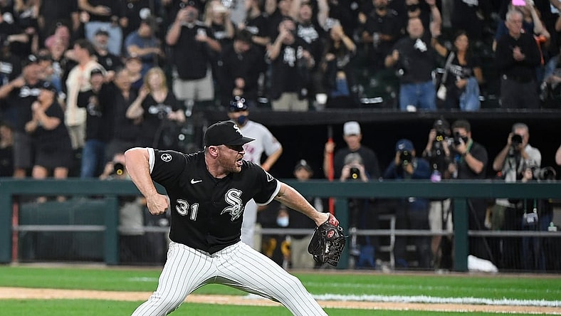 Oct 10, 2021; Chicago, Illinois, USA; Chicago White Sox relief pitcher Liam Hendriks (31) reacts after striking out Houston Astros second baseman Jose Altuve (not pictured) for the final out of the game during game three of the 2021 ALDS at Guaranteed Rate Field. Mandatory Credit: Matt Marton-USA TODAY Sports