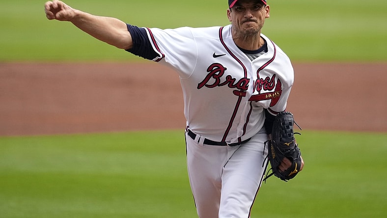 Oct 12, 2021; Cumberland, Georgia, USA; Atlanta Braves starting pitcher Charlie Morton (50) throws a pitch against the Milwaukee Brewers in the first inning during game four of the 2021 ALDS at Truist Park. Mandatory Credit: Dale Zanine-USA TODAY Sports