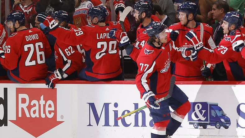 Oct 13, 2021; Washington, District of Columbia, USA; Washington Capitals right wing T.J. Oshie (77) celebrates with teammates after scoring a goal against the New York Rangers during the first period at Capital One Arena. Mandatory Credit: Geoff Burke-USA TODAY Sports