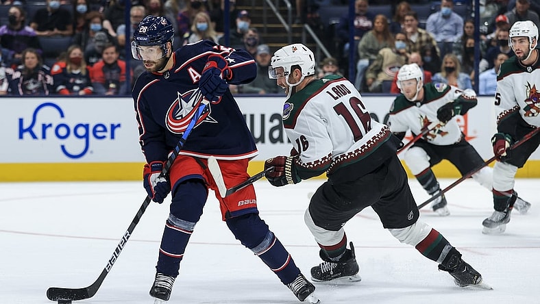 Oct 14, 2021; Columbus, Ohio, USA; Columbus Blue Jackets right wing Oliver Bjorkstrand (28) skates against Arizona Coyotes left wing Andrew Ladd (16) in the first period at Nationwide Arena. Mandatory Credit: Aaron Doster-USA TODAY Sports