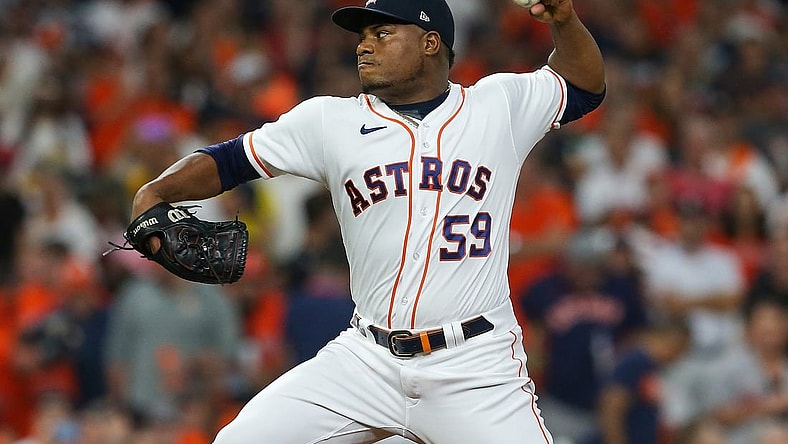 Oct 15, 2021; Houston, Texas, USA; Houston Astros starting pitcher Framber Valdez (59) pitches against the Boston Red Sox during the first inning in game one of the 2021 ALCS at Minute Maid Park. Mandatory Credit: Thomas Shea-USA TODAY Sports