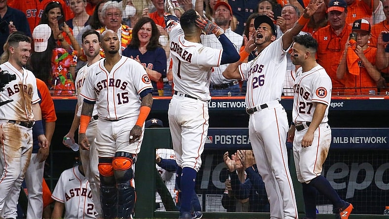 Oct 15, 2021; Houston, Texas, USA; Houston Astros shortstop Carlos Correa (1) celebrates with Jose Siri (26) after hitting a go-ahead solo home run against the Boston Red Sox during the seventh inning in game one of the 2021 ALCS at Minute Maid Park. Mandatory Credit: Troy Taormina-USA TODAY Sports