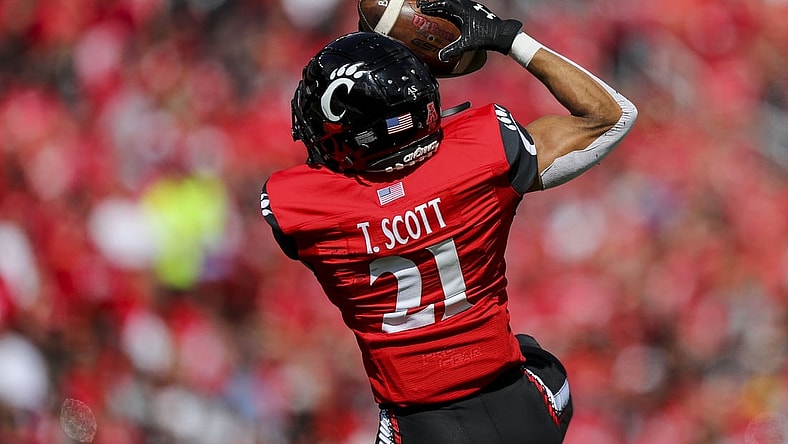 Oct 16, 2021; Cincinnati, Ohio, USA; Cincinnati Bearcats wide receiver Tyler Scott (21) catches a pass against the UCF Knights in the first half at Nippert Stadium. Mandatory Credit: Katie Stratman-USA TODAY Sports