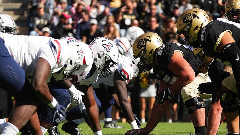 Oct 16, 2021; Boulder, Colorado, USA; Members of the Arizona Wildcats line up across from the Colorado Buffaloes in the first quarter at Folsom Field. Mandatory Credit: Ron Chenoy-USA TODAY Sports