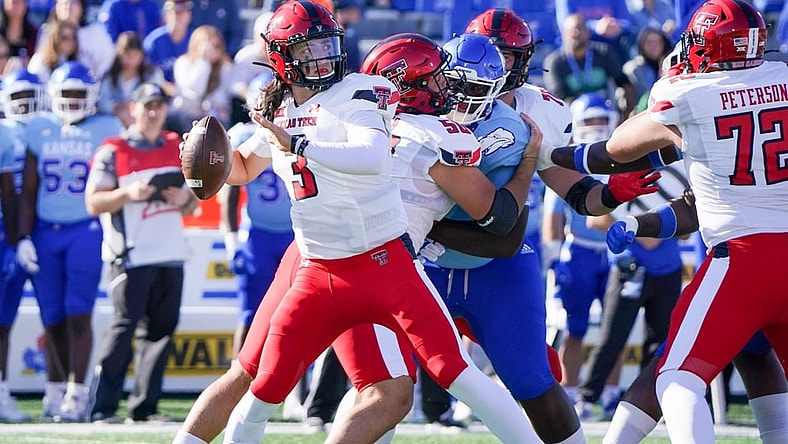 Oct 16, 2021; Lawrence, Kansas, USA; Texas Tech Red Raiders quarterback Henry Colombi (3) passes the ball against the Kansas Jayhawks during the first half at David Booth Kansas Memorial Stadium. Mandatory Credit: Denny Medley-USA TODAY Sports