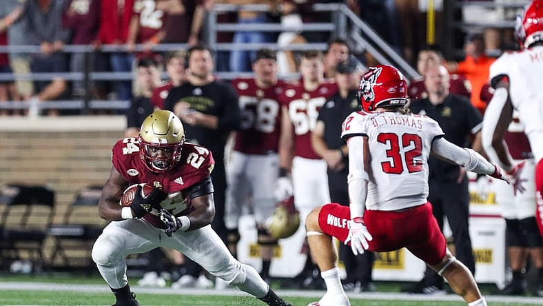 Oct 16, 2021; Chestnut Hill, Massachusetts, USA; Boston College Eagles running back Pat Garwo III (24) runs the ball during the first half against the North Carolina State Wolfpack at Alumni Stadium. Mandatory Credit: Paul Rutherford-USA TODAY Sports