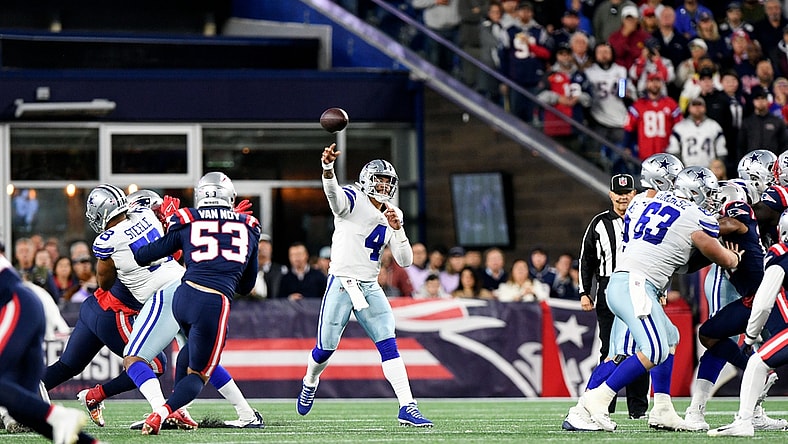Oct 17, 2021; Foxborough, Massachusetts, USA; Dallas Cowboys quarterback Dak Prescott (4) throws the ball against the New England Patriots during the second half at Gillette Stadium. Mandatory Credit: Brian Fluharty-USA TODAY Sports
