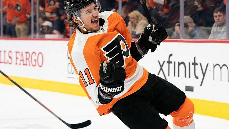 Oct 18, 2021; Philadelphia, Pennsylvania, USA; Philadelphia Flyers right wing Travis Konecny (11) celebrates after scoring against the Seattle Kraken during the first period at Wells Fargo Center. Mandatory Credit: Bill Streicher-USA TODAY Sports