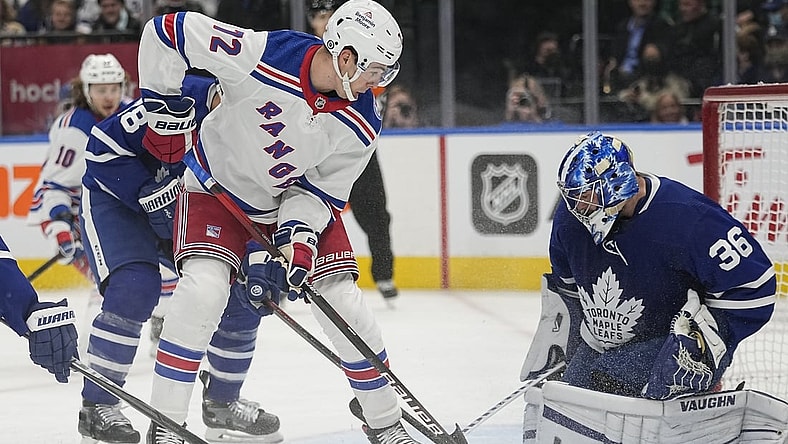 Oct 18, 2021; Toronto, Ontario, CAN; New York Rangers forward Filip Chytil (72) shoots the puck at Toronto Maple Leafs goaltender Jack Campbell (36) during the first period at Scotiabank Arena. Mandatory Credit: John E. Sokolowski-USA TODAY Sports