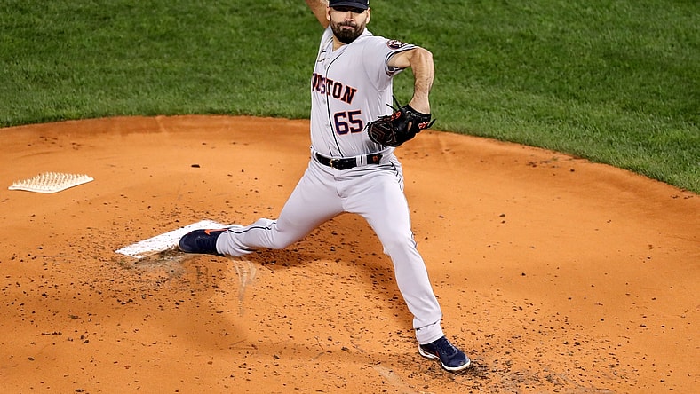 Oct 18, 2021; Boston, Massachusetts, USA; Houston Astros starting pitcher Jose Urquidy (65) pitches against the Boston Red Sox during the second inning of game three of the 2021 ALCS at Fenway Park. Mandatory Credit: Paul Rutherford-USA TODAY Sports