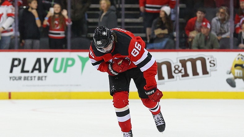 Oct 19, 2021; Newark, New Jersey, USA; New Jersey Devils center Jack Hughes (86) skates off the ice after being hit during the first period of their game against the Seattle Kraken at Prudential Center. Mandatory Credit: Ed Mulholland-USA TODAY Sports