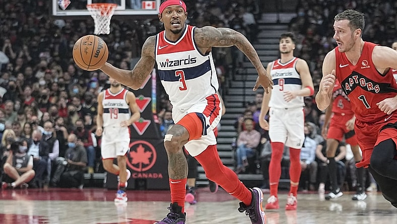 Oct 20, 2021; Toronto, Ontario, CAN; Washington Wizards guard Bradley Beal (3) dribbles away from Toronto Raptors guard Goran Dragic (1) during the first half at Scotiabank Arena. Mandatory Credit: John E. Sokolowski-USA TODAY Sports