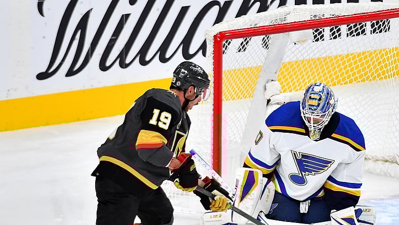 Oct 20, 2021; Las Vegas, Nevada, USA; St. Louis Blues goaltender Jordan Binnington (50) makes a save against Vegas Golden Knights right wing Reilly Smith (19) during the first period at T-Mobile Arena. Mandatory Credit: Stephen R. Sylvanie-USA TODAY Sports
