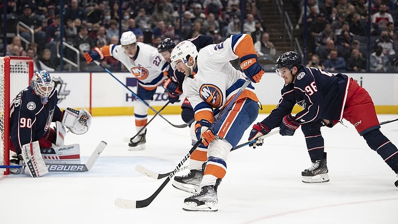 Oct 21, 2021; Columbus, Ohio, USA; New York Islanders right wing Kyle Palmieri (21) shoots the puck against Columbus Blue Jackets goaltender Elvis Merzlikins (90) during the first period at Nationwide Arena. Mandatory Credit: Gaelen Morse-USA TODAY Sports