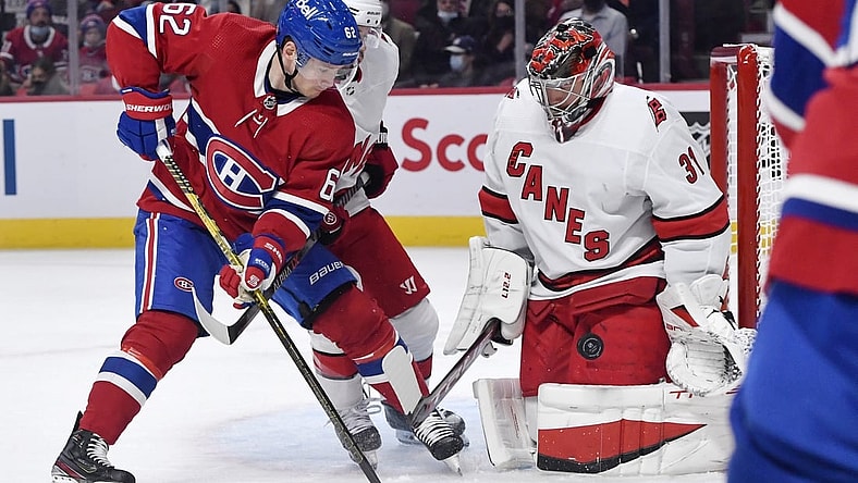 Oct 21, 2021; Montreal, Quebec, CAN; Carolina Hurricanes goalie Frederik Andersen (31) stops Montreal Canadiens forward Artturi Lehkonen (62) during the first period before at the Bell Centre. Mandatory Credit: Eric Bolte-USA TODAY Sports