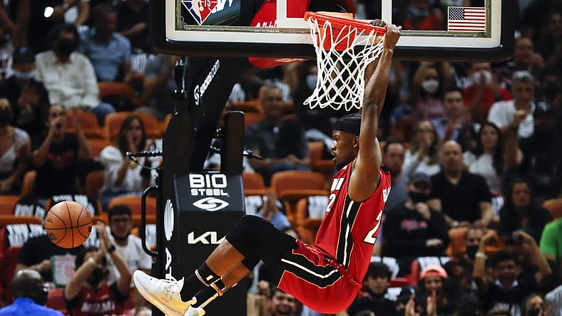 Oct 21, 2021; Miami, Florida, USA; Miami Heat forward Jimmy Butler (22) dunks the ball against the Milwaukee Bucks during the first period of the game at FTX Arena. Mandatory Credit: Sam Navarro-USA TODAY Sports