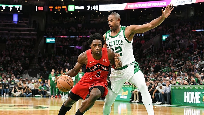 Oct 22, 2021; Boston, Massachusetts, USA; Toronto Raptors forward OG Anunoby (3) drives to the basket against Boston Celtics center Al Horford (42) during the first half at the TD Garden. Mandatory Credit: Brian Fluharty-USA TODAY Sports