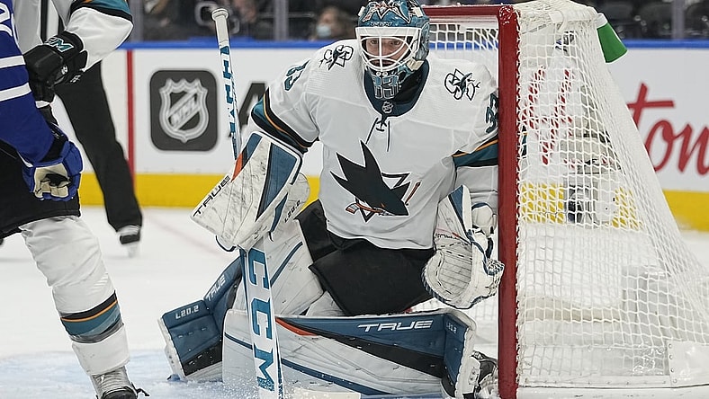 Oct 22, 2021; Toronto, Ontario, CAN; San Jose Sharks goaltender Adin Hill (33) loks for the puck against the Toronto Maple Leafs during the second period at Scotiabank Arena. Mandatory Credit: John E. Sokolowski-USA TODAY Sports