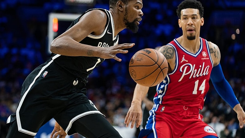 Oct 22, 2021; Philadelphia, Pennsylvania, USA; Brooklyn Nets forward Kevin Durant (7) drives against Philadelphia 76ers forward Danny Green (14) during the first quarter at Wells Fargo Center. Mandatory Credit: Bill Streicher-USA TODAY Sports