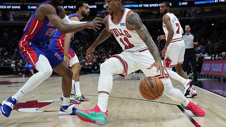Oct 23, 2021; Chicago, Illinois, USA; Chicago Bulls forward DeMar DeRozan (11) drives on Detroit Pistons guard Josh Jackson (20) during the first half at United Center. Mandatory Credit: David Banks-USA TODAY Sports