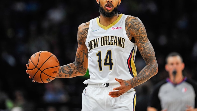 Oct 23, 2021; Minneapolis, Minnesota, USA; New Orleans Pelicans forward Brandon Ingram (14) controls the ball during the fourth quarter against the Minnesota Timberwolves at Target Center. Mandatory Credit: Jeffrey Becker-USA TODAY Sports