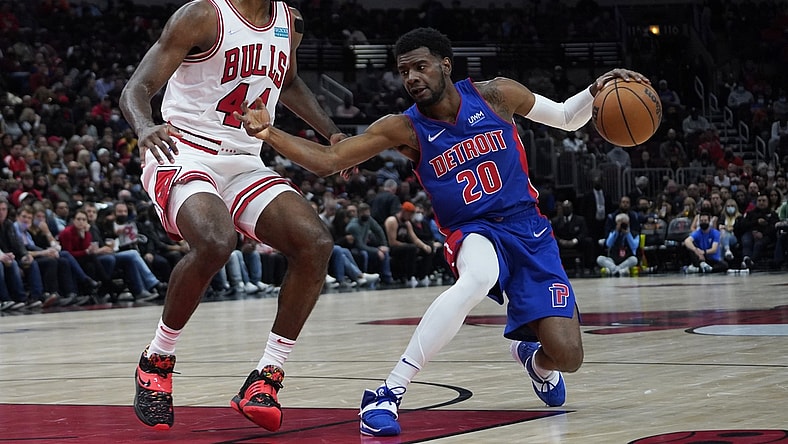 Oct 23, 2021; Chicago, Illinois, USA; Detroit Pistons guard Josh Jackson (20) drives against Chicago Bulls forward Patrick Williams (44) during the second half at United Center. Mandatory Credit: David Banks-USA TODAY Sports