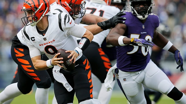 Cincinnati Bengals quarterback Joe Burrow (9) scrambles out of the pocket in the first quarter of the NFL Week 7 game between the Baltimore Ravens and the Cincinnati Bengals at M&T Bank Stadium in Baltimore on Sunday, Oct. 24, 2021. The Bengals led 13-10 at halftime.

Cincinnati Bengals At Baltimore Ravens Week 7
