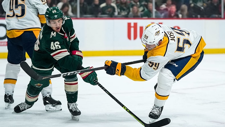 Oct 24, 2021; Saint Paul, Minnesota, USA; Nashville Predators defenseman Roman Josi (59) shoots and scores a goal during the first period against the Minnesota Wild at Xcel Energy Center. Mandatory Credit: Brace Hemmelgarn-USA TODAY Sports