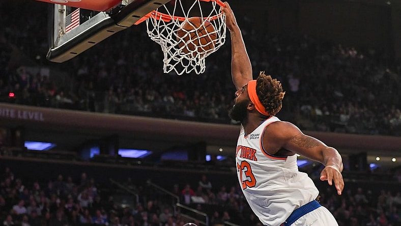Oct 24, 2021; New York, New York, USA;  New York Knicks center Mitchell Robinson (23) dunks the ball against the Orlando Magic during the second quarter at Madison Square Garden. Mandatory Credit: Dennis Schneidler-USA TODAY Sports